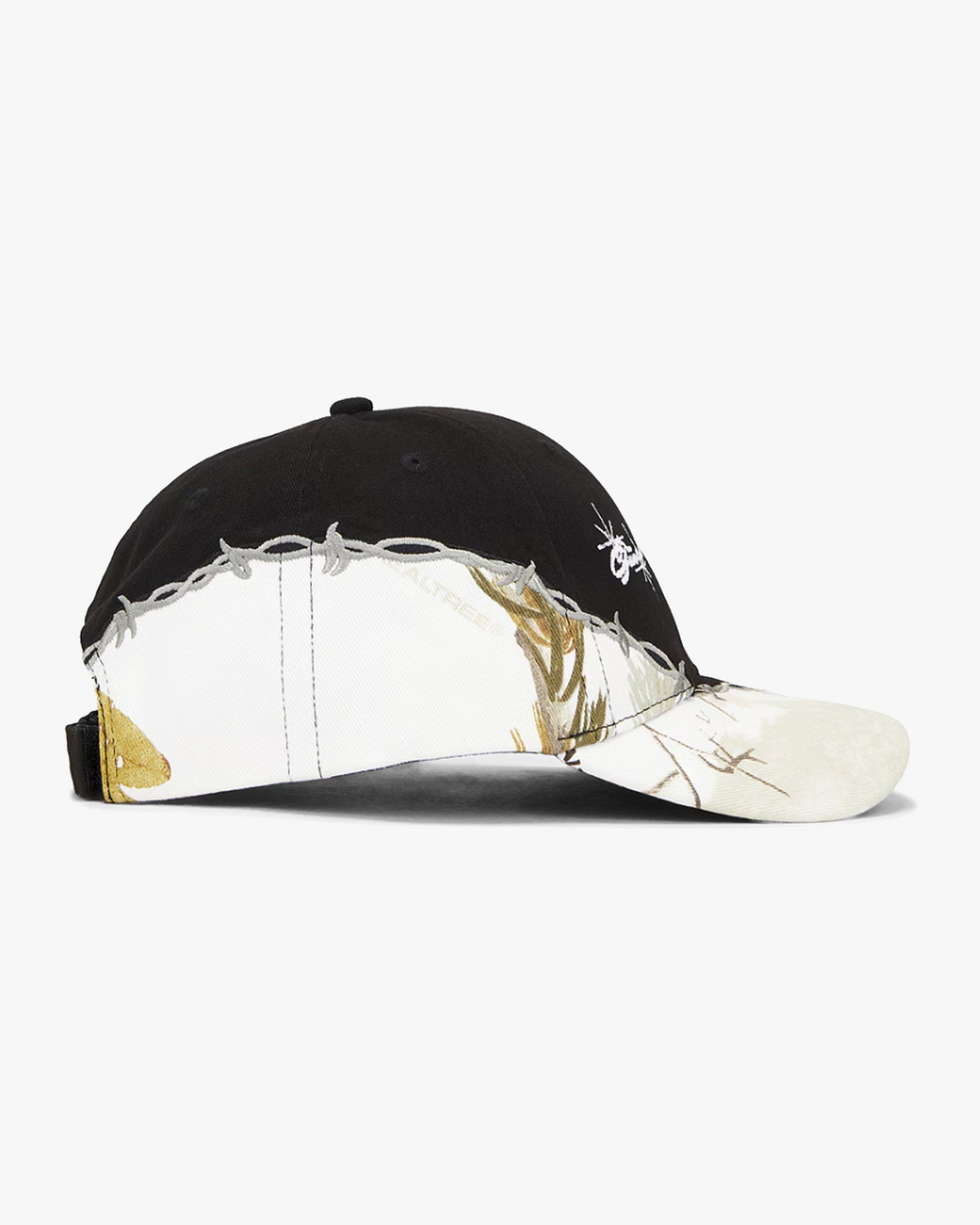 Camo Logo Hat - two-tone baseball cap with black crown top, snow camo lower panels and brim, barbed wire embroidery across the horizontal seam, and embroidered logo on front