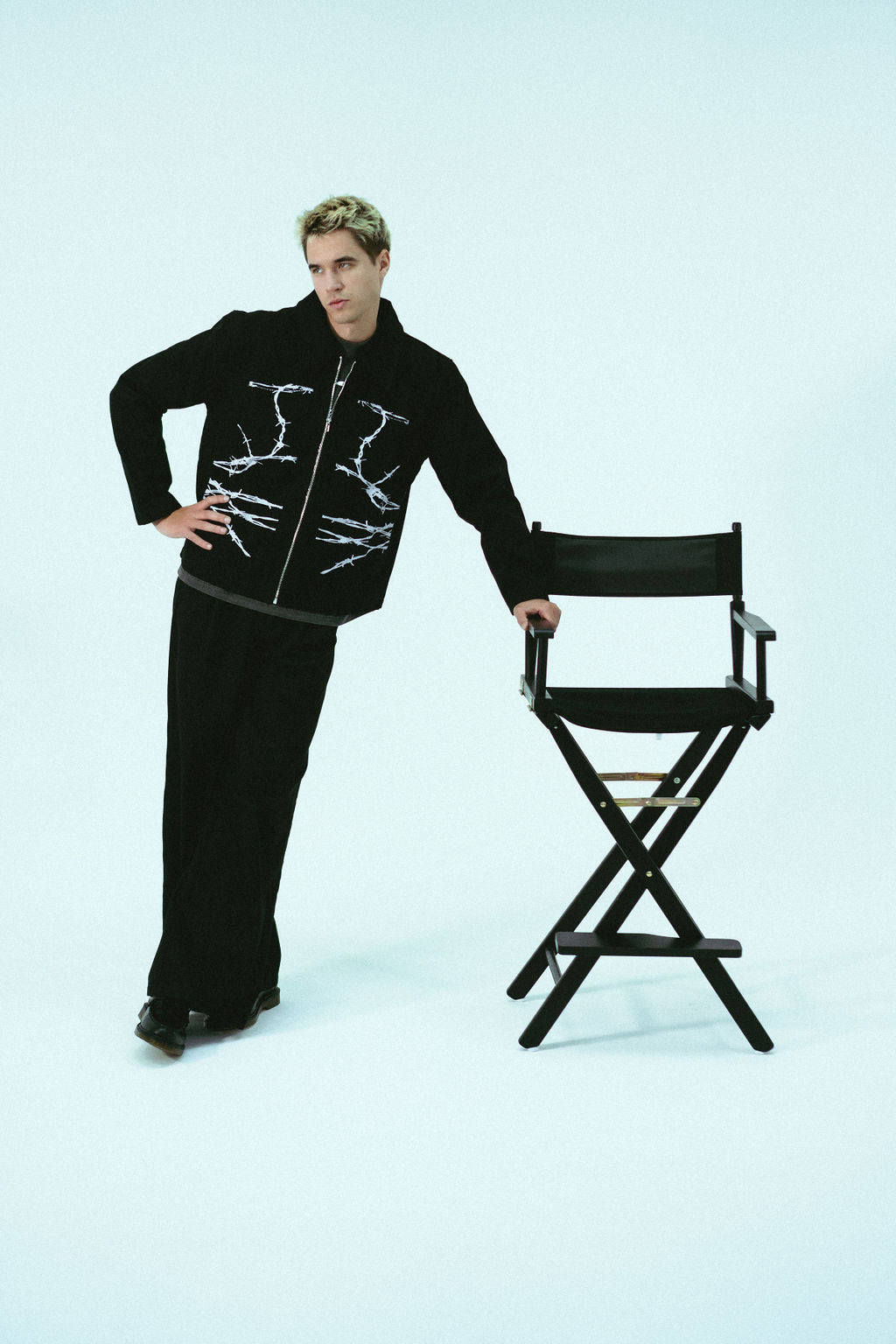 Barbed Wire Carpenter Jacket - black zip-up work jacket with white barbed wire ribcage embroidery on the front panels
