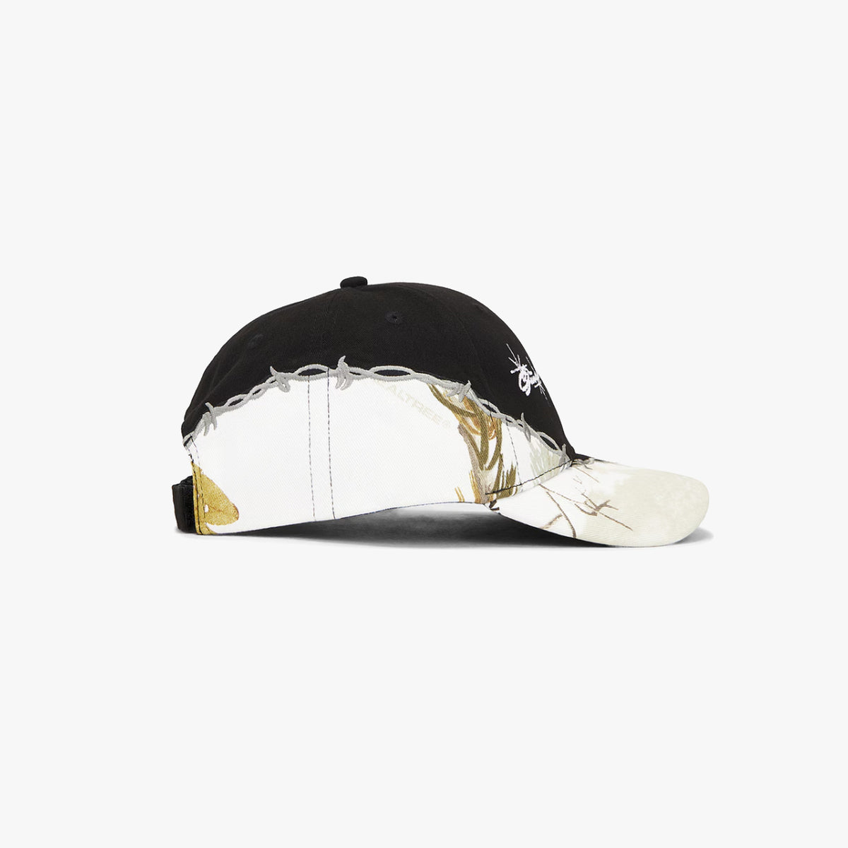 Camo Logo Hat - two-tone baseball cap with black crown top, snow camo lower panels and brim, barbed wire embroidery across the horizontal seam, and embroidered logo on front
